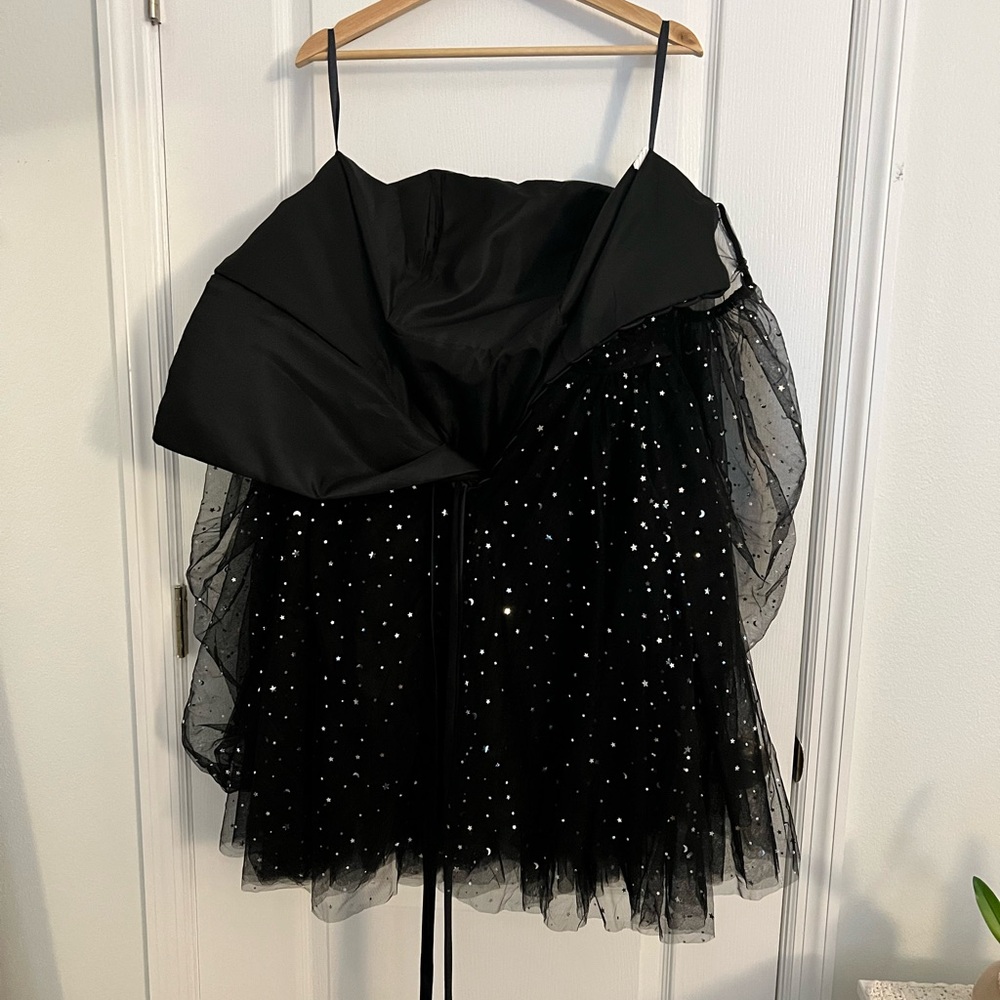 Short Black and sparkly dress, with laced back, never worn.